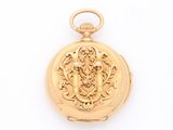 an image of a gold pocket watch with a lion on it