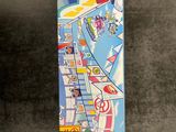 a picture of a bookmark that has a picture of a city on it