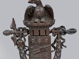 une image représentant une statue en bronze d'un oiseau coiffé d'une couronne