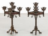 pair of antique brass candelabs with red glass inserts