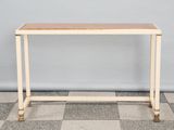 a wooden table sitting on top of a checkered floor