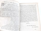 an open book that is sitting on a table