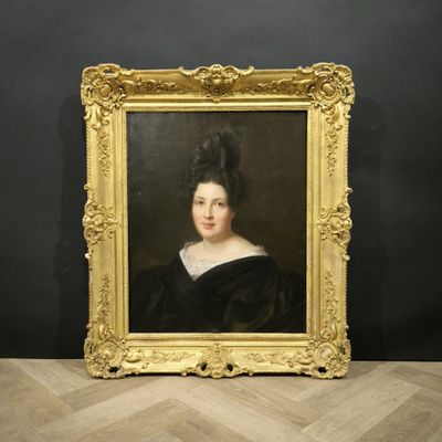 a painting of a woman in a black dress and a gold frame