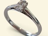 a ring with a diamond in it on a white background
