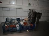 a blue basket filled with eggs on a kitchen counter