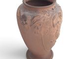 a brown vase with a face on it on a white surface