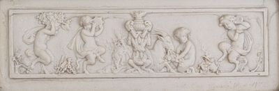 a white relief of a group of people on a wall
