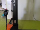 a picture of a fork lift truck in a warehouse