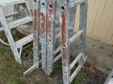 three ladders that are sitting next to each other