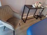 a chair and a table in a small room