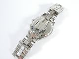 an image of a close up of a wrist watch on a white surface