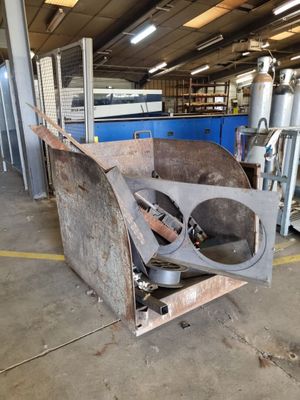 a large machine that is sitting inside of a building