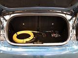 a car trunk with a hose in it and a hose in the trunk