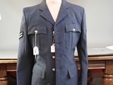 a mannequin wearing a military uniform on a table