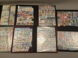 many different types of stamps on a table