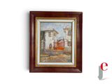 peinture à l'huile encadrée représentant une scène de rue avec des bâtiments et une voiture rouge