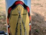 a close up of a bike with a sticker on it