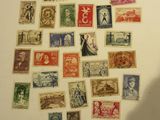 a lot of stamps that are on the wall