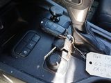 a car dashboard with a sticker on it with a price tag attached to it