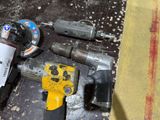 tools that are sitting on the floor next to each other