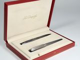 two pens in a red box on a white surface
