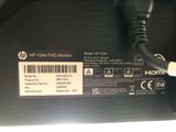 a close up of a computer monitor with a cable connected to it
