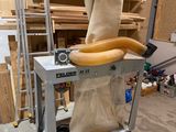 an image of a dust collector in a garage