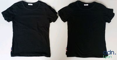 two black t - shirts on a white background, one black and one white