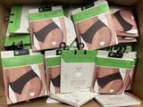 a box full of assorted underwear on display in a store
