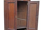 a wooden cabinet with a door open on a white background