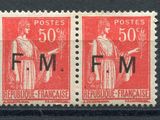two red and black postages with a man and woman on them