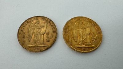 deux souverains d'or, dont l'un est une femme et l'autre un homme