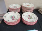 a lot of plates that are on a table