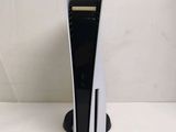 a black and white computer tower on a white surface