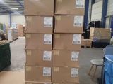 boxes stacked on top of each other in a warehouse