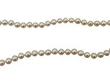 a white pearl necklace with a gold clasp on a white background