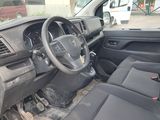 the interior of a car with a steering wheel and dashboard