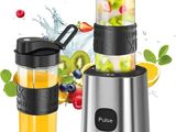 un gros plan sur un mixeur rempli de fruits et de légumes