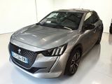 the silver car is parked in the showroom of a dealers showroom