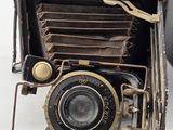 an old camera that is sitting on a table