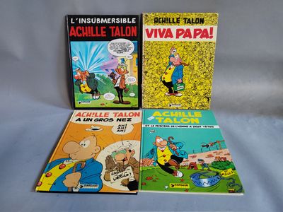 trois livres sont posés sur une surface blanche avec un fond bleu