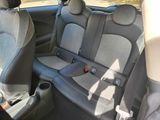 two seats in the back of a car that are empty