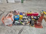 a lot of tools on the floor in the garage