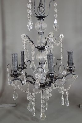 Suspension en métal moucheté noir et pampilles, fût en verre…