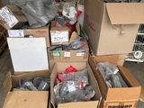 many boxes of assorted items sitting on the floor