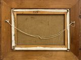 an old picture frame with a rope hanging from it ' s side