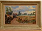une peinture à l'huile représentant une scène de vie à la ferme, dans un cadre doré, posée sur une table en bois
