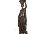 une statue en bronze représentant une femme portant un pot sur la tête