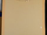 a picture of an easel with a piece of paper on it
