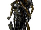 bronze statue of a woman and a boy with a dog